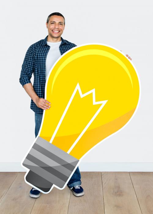 Happy man holding a light bulb icon - 469637