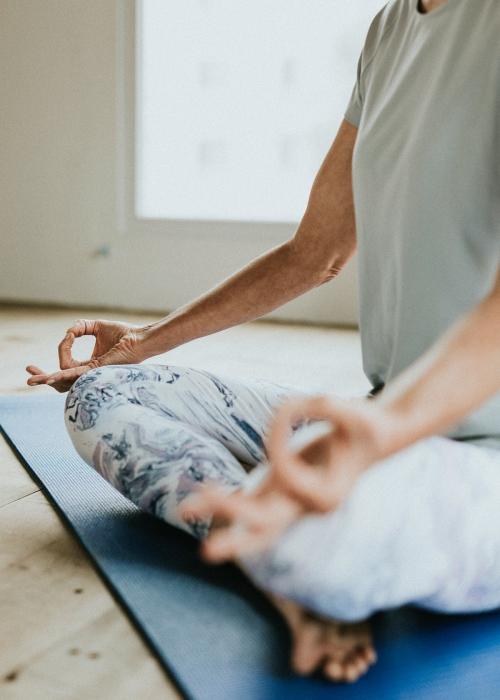 Fitness woman in a Sukhasana pose - 1226862