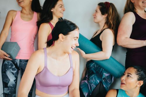 Group of happy friends in yoga class - 1226925