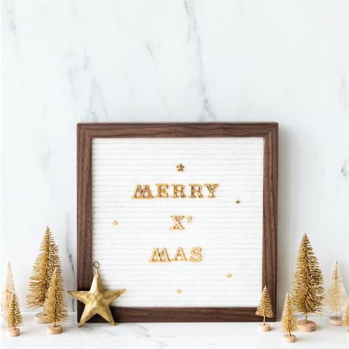 Golden merry Xmas in a wooden frame - 1231323