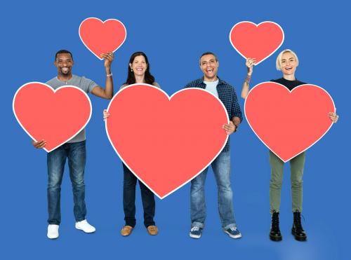 Diverse people holding heart shaped icons - 470180