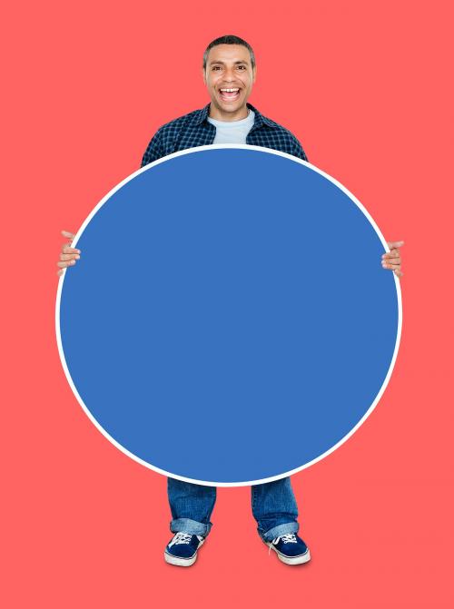 Man showing a blank blue circle board - 470251