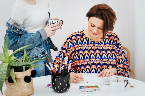 Female artists working on a design project together - 592797