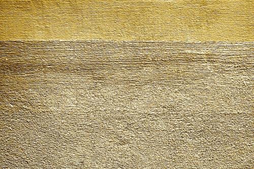 Roughly gold painted concrete wall surface background - 596827