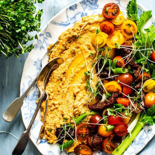 Hummus with veggies on a plate - 893643