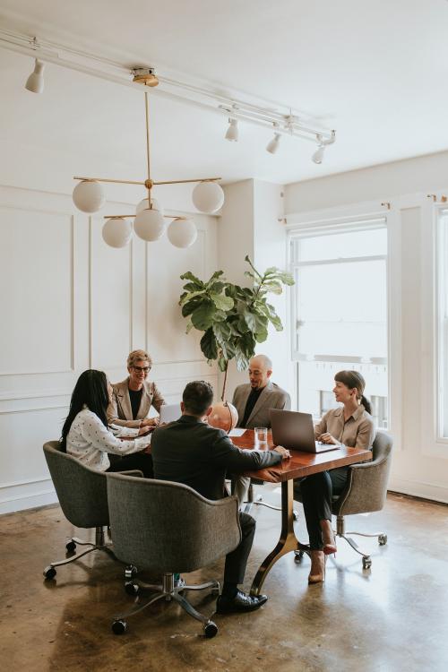 Happy business people in a meeting - 1216677