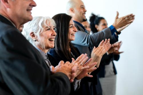 Diverse business people applauding with joy - 1218050