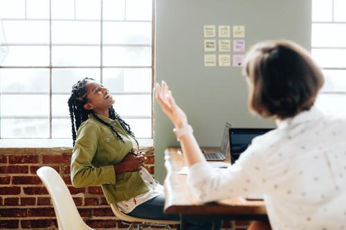 Cheerful diverse colleagues at the office - 1226489