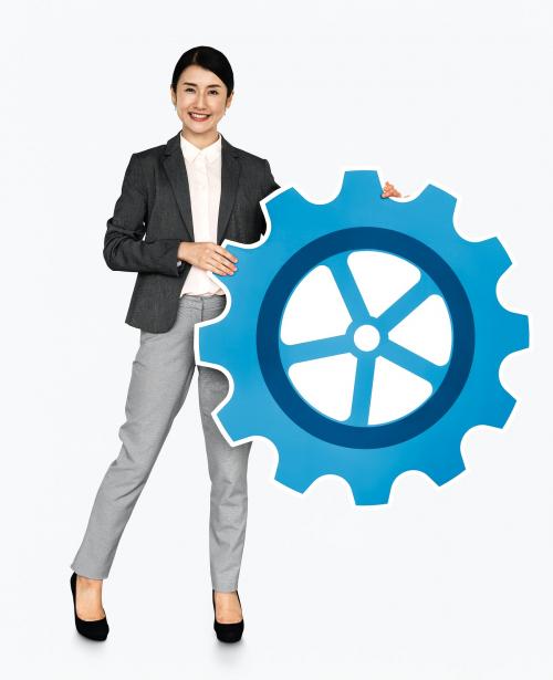 Japanese woman holding a cogwheel - 468442