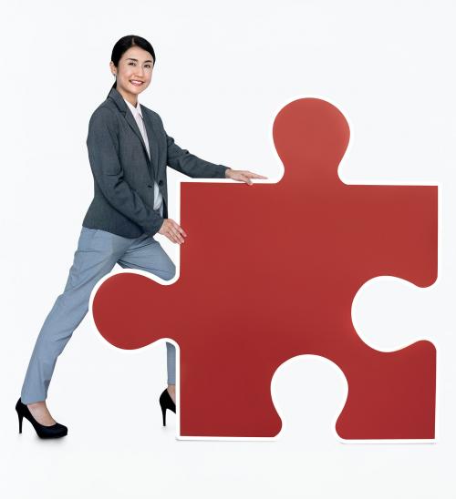 Happy woman holding a puzzle icon - 468480