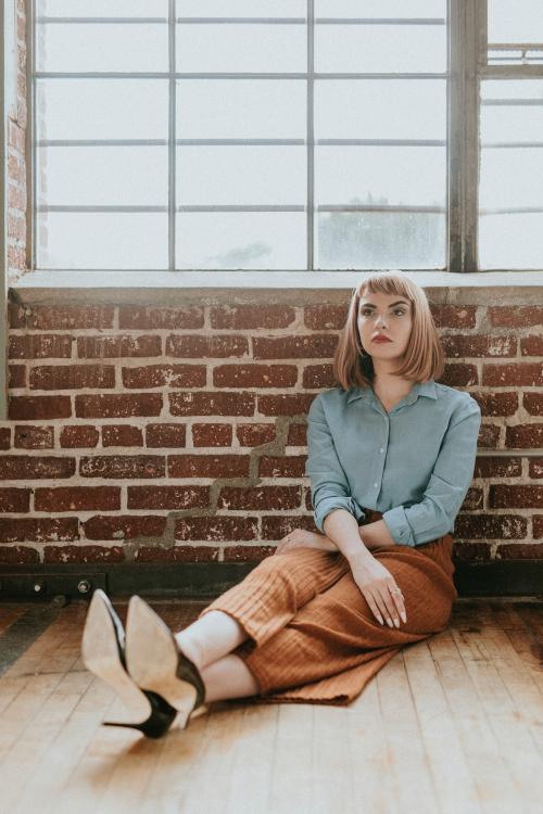 Short brown hair woman in a denim shirt - 1235426