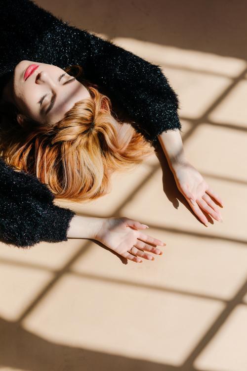 Brown hair woman in a black fluffy sweater - 1235512