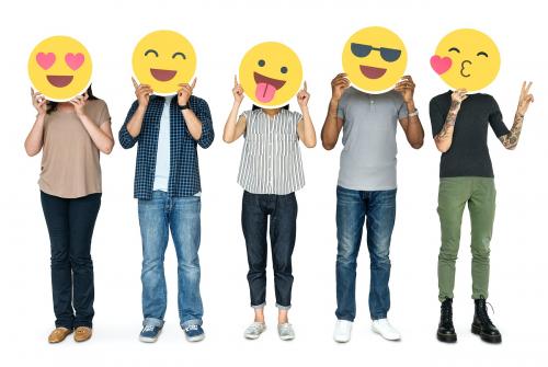 Diverse people holding happy emoticons - 469250