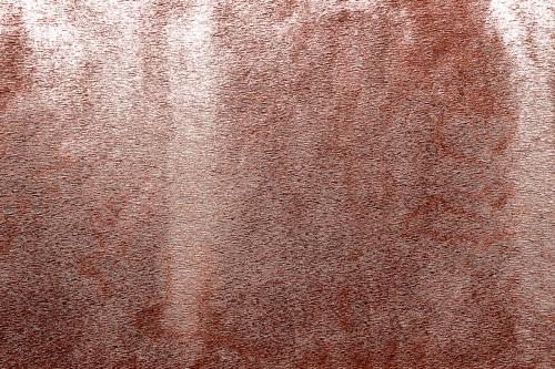 Roughly pink gold painted concrete wall surface background - 596877