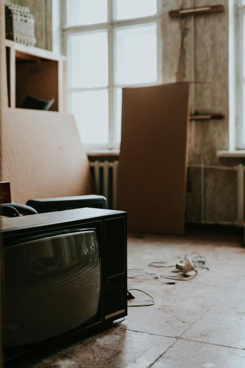 TV on the floor of an old house - 598387