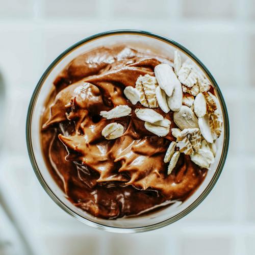 Homemade organic avocado chocolate mousse in a bowl - 893653