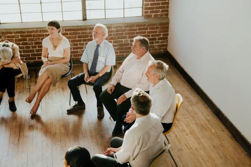 People sitting and talking with a group - 1218051