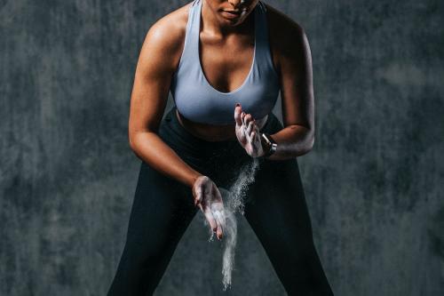 Sportive woman getting ready for a training - 1222494