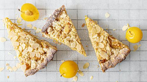 Sliced mirabelle plum tart on a cooling rack - 1225243