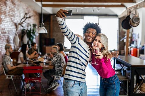 Friends taking a selfie at a party - 1227030