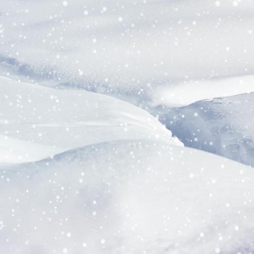 Closeup of snowy hills background - 1229595