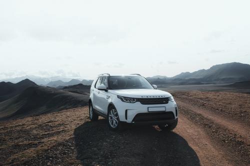 2019, Iceland, White Landrover driving in the countryside - 1234771