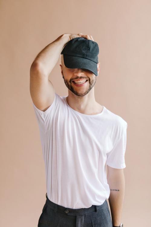 Playful man in a white tee - 1235360