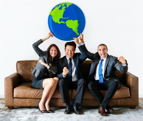 Business people holding global icon - 414634