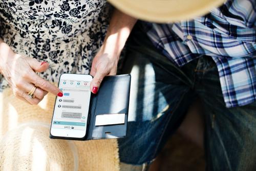 Senior woman using her mobile - 418947