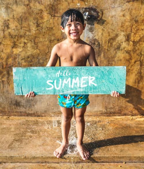 Boy holding a hello summer board - 424461