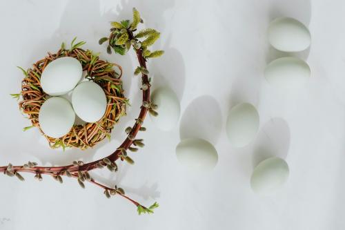 Aerial view of raw eggs on a white marble table - 937419