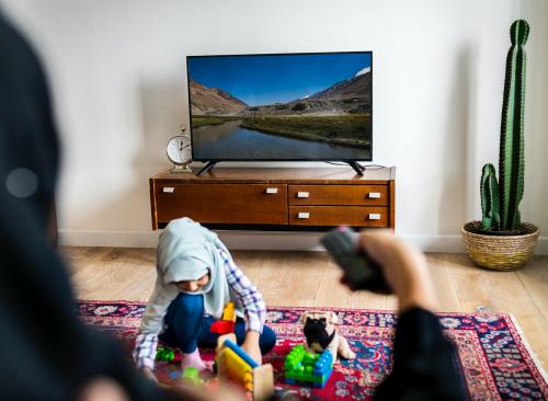 Muslim family relaxing and playing at home - 425776