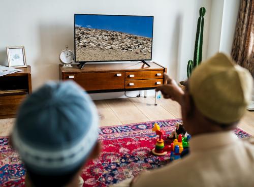 Muslim family relaxing in the home - 425781