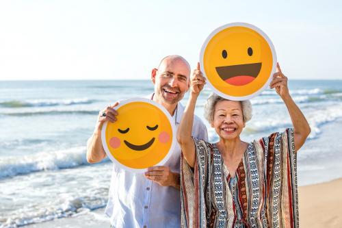 Happy mature mother and son at the beach - 428689