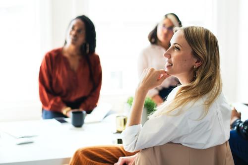 Happy businesswomen in a meeting - 1220803