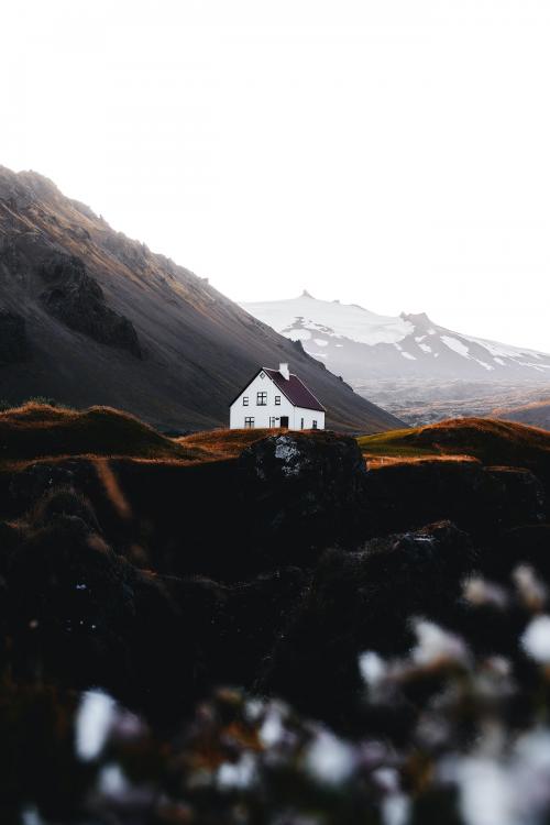 White house on a hill on a misty day in Iceland - 1227089