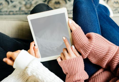 Women using digital tablet together - 398759