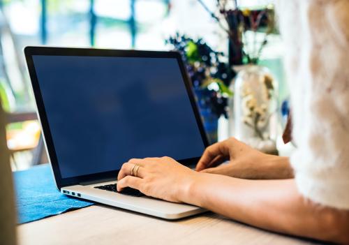 Closeup of woman using laptop - 398775