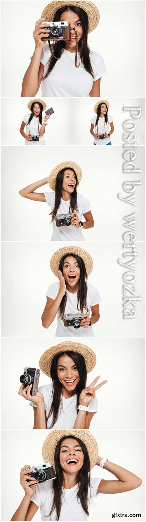 Portrait of a smiling young woman in hat standing