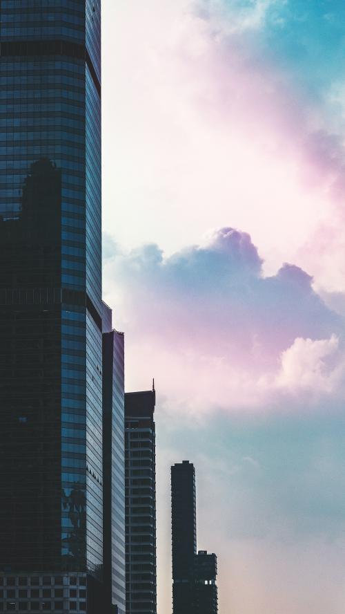 Skyscraper under cotton candy sky mobile phone wallpaper - 1214181