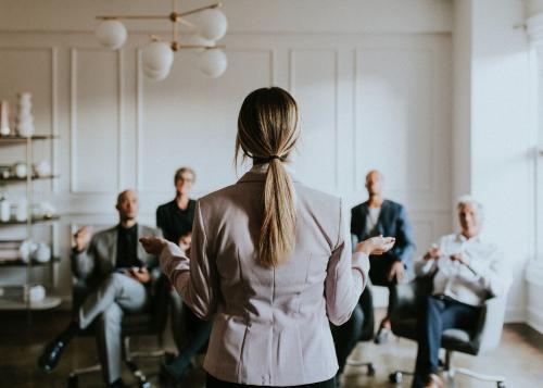 Businesswoman talking in a seminar - 1216686