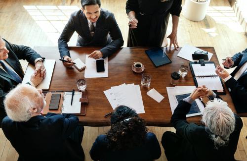 Businesspeople brainstorming in a meeting - 1218024