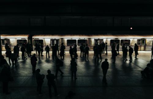 People waiting for a train on a platform - 1219099