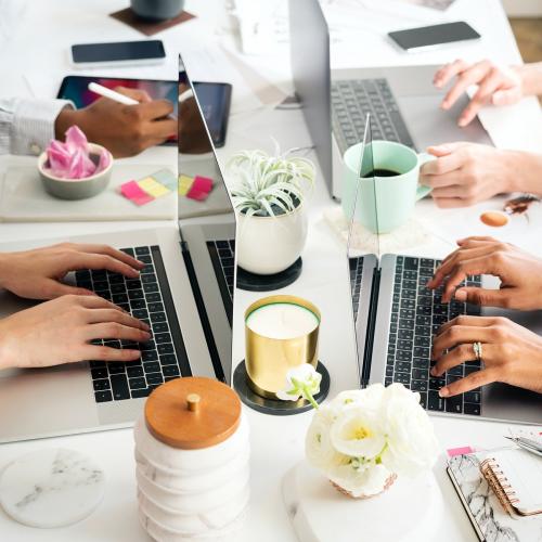 Businesswomen using a laptop at work - 1220788