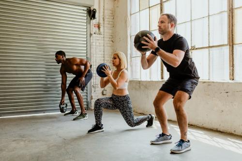 Diverse people working out with fitness balls - 1222565