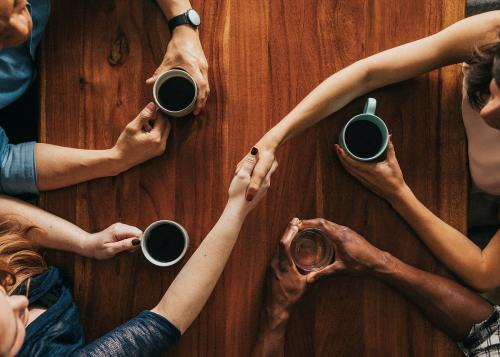 Partner shaking hands in a cafe - 1224282