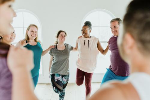 Group of people doing quadriceps stretching - 1226865