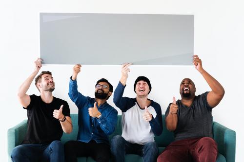 Group of diverse people with blank banner - 414524