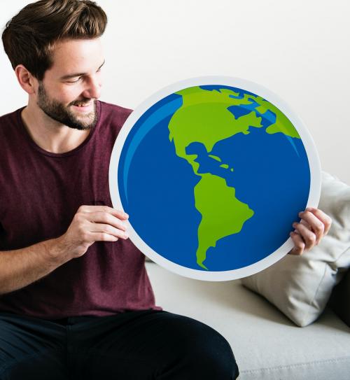 Cheerful man holding globe icon - 414536