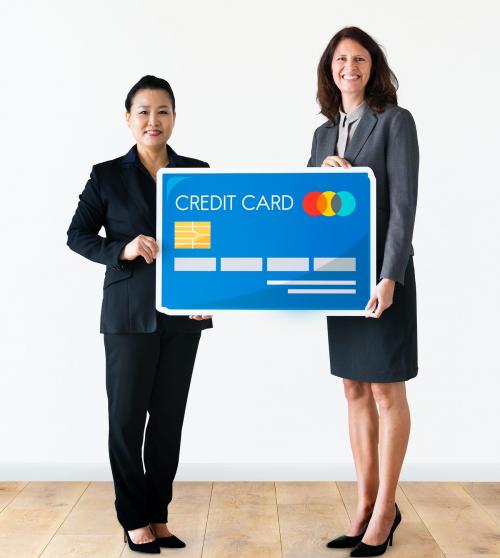 Businesswomen holding credit card icon - 414563